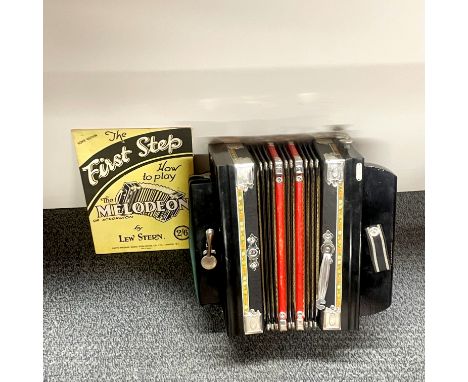 A boxed melodeon.