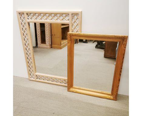 A light oak wall mirror with a further pine mirror, largest 100x 80cm.