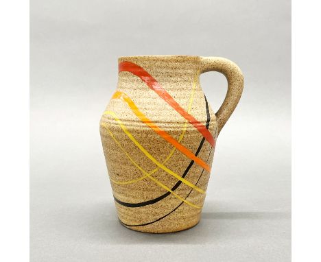 An unusual Clarice Cliff Bizarre gold stone jug, H. 18cm.