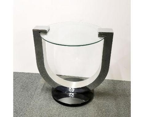 A chrome and plate glass side table, H. 62.5cm glass Dia. 56cm.
