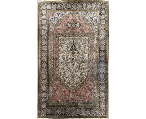 A small eastern style rug, 161 x 104cm.