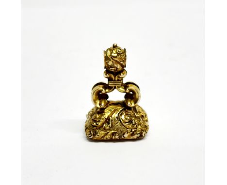 A Victorian yellow metal watch fob set with a large citrine, 3.5 x 2 x 2.3cm.