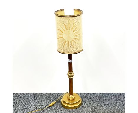 A counterparty brass and metal table lamp with fibreglass sunburnt shade, H. 72cm.