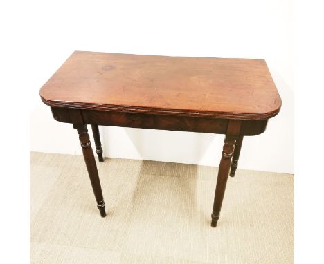 A figured mahogany veneered folding card table, H. 72cm unfolded 90.5 x 90cm. Prov. Little Wakering Hall.