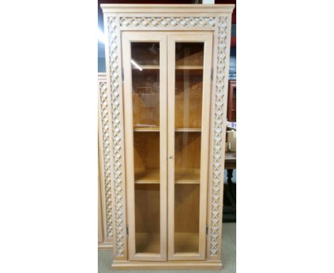 A heavy quality light oak display cabinet, 205 x 89 x 41cm.