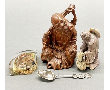 A Chinese hallmarked silver spoon together with a hardstone carved wooden figure and an inside painted crystal fan, tallest H