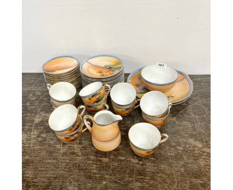 A Noritake extensive sunset tea set, eleven cups.