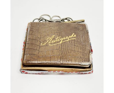A hallmarked 'London 1923' silver cornered leather autograph book with propelling pencil on chain, size 14cm x 12cm.