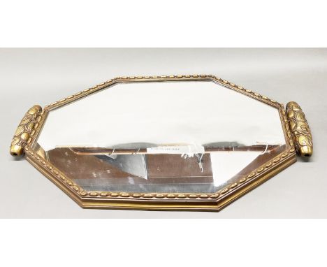An impressive Art Deco bronze wall mirror. W. 78cm.