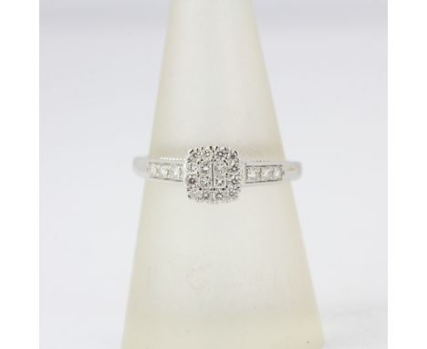 A hallmarked 9ct white gold diamond set ring, approx. 0.50ct total, ring size N.