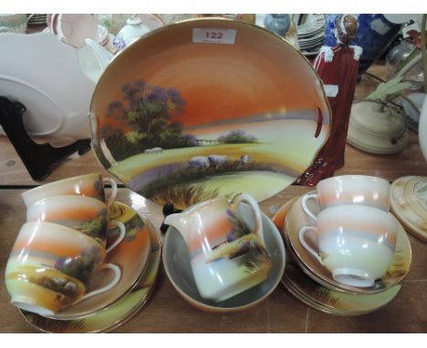 An early 20th century tea service by Noritake, having sheep in sunset pattern 
