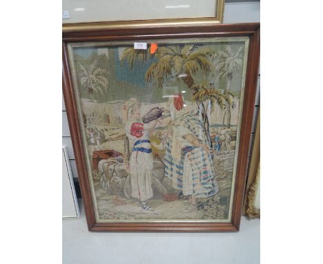 A mid Victorian Berlin woolwork tapestry panel of Middle Eastern design