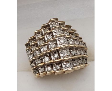 A Ladies impressive 9ct gold and diamond cluster ring. Set with 1ct of diamonds. [Ring size N] [10.32 Grams] 