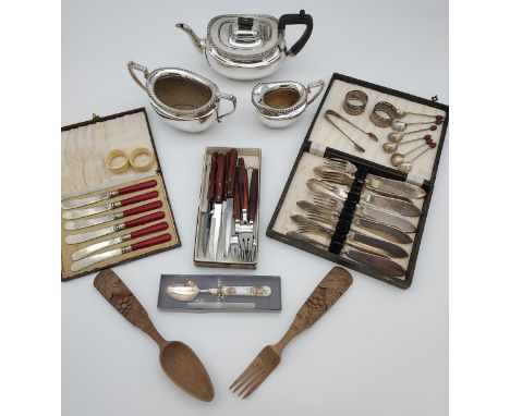 A Selection of Silver plated and E.P Wares to include three piece tea service, coffee bean spoons, hand carved wooden serving