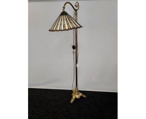 An 19th century heavy brass floor reading lamp with Tiffany style stain glass shade. Manufacturer Kaiser &amp; Co Germany. [1