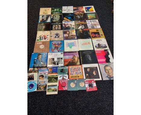 A lot of various records to include; Rod Stewart, Ultravox, John Denver, Elton John, Jimi Hendrix, Paul McCartney, Abba, Luth