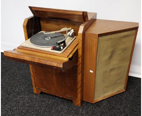 An Art Deco style cabinet fitted with a Garrard AT6 Turntable. Together with large corner speaker. 