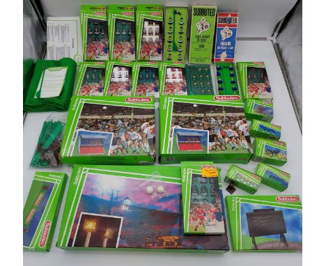 A Collection of vintage Subbuteo to include accessories and teams. Teams include England, Brazil, Celtic, Arsenal, West Ham, 