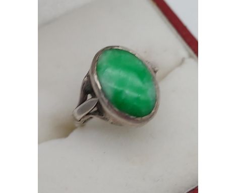 A Sterling silver and jade ring, [Ring size E] 