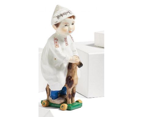 KIND AUF EINEM HOLZPFERD REITEND. Meissen. Datierung: Nach 1934. Meister/Entwerfer: Entwurf K. Hentschel 1905. Material: Porz