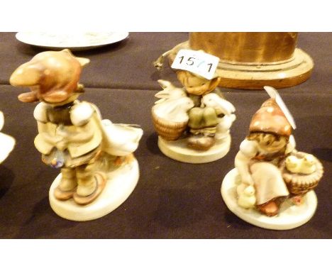 Three Hummel child figurines 