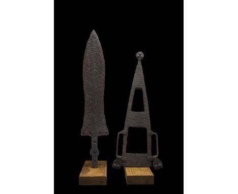 Ca. 100 AD. An iron pugio, or squat triangular dagger with a midrib and rivet holes to accept a handle. This dagger comes wit