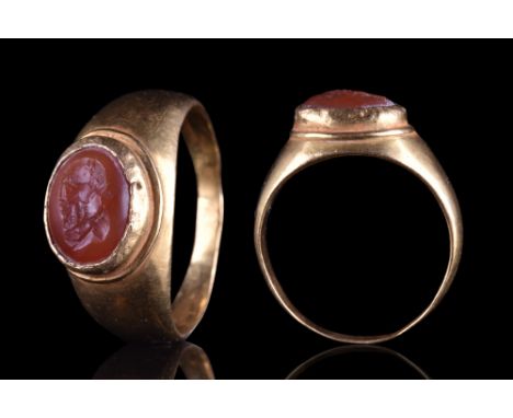 Ca. end of 1st century AD. A carnelian intaglio skilfully engraved with a male portrait, possibly an emperor. The figure is p