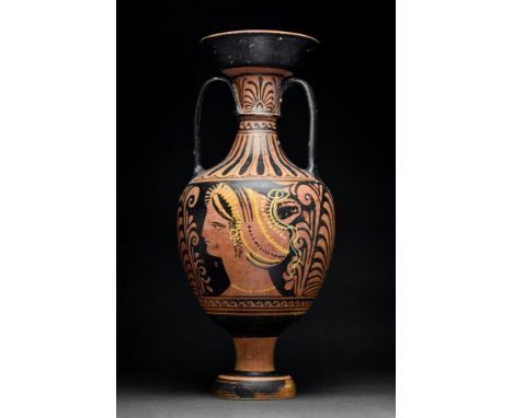 Ca. 320 AD. A huge and beautiful red figure Apulian amphora. On one side is a seated, a flowering plant in an Ionic naiskos, 