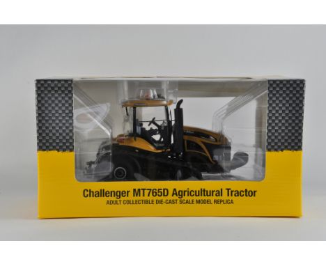 USK 1/32 Challenger MT765D Tractor. Ex Display so VG to E.