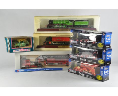 Misc diecast models from various makers. M in Boxes. (7)