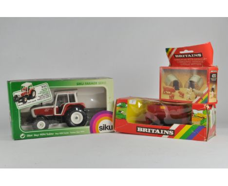 Siku 1/32 Steyr Tractor plus Britains issues. NM with Boxes. (3)