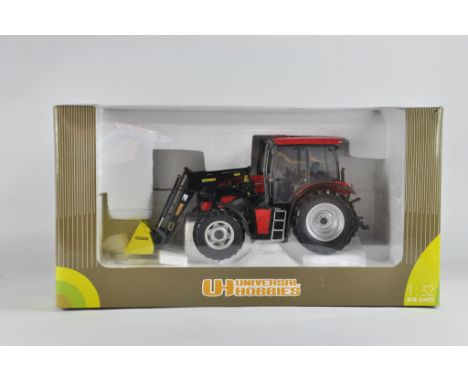 Universal Hobbies 1/32 Terrion Tractor with Loader. Ex Display. VG to E in Opened box.