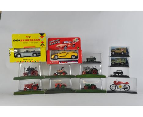 Universal Hobbies 1/43 Tractor group plus other diecast issues. M in Boxes. (13)