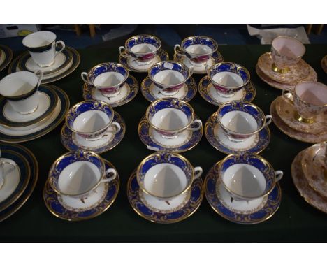A Set of Eleven Coalport Museum Teacups and Saucers 