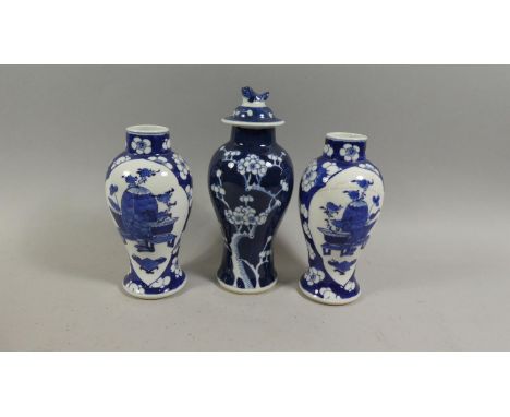 A Pair of Baluster Vases with Four Character Kangxi Mark to Base, 17cm high (One AF) Together with a Larger Lidded Example, 2