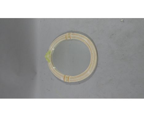 A Ceramic Framed Oval Wall Mirror, 52cm High 