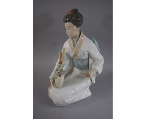 A Large Nao Figure of Kneeling Geisha Girl, 35cm High 