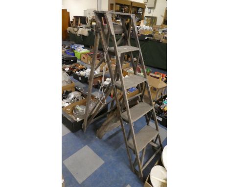 One Large and One Small Vintage Step Ladders 