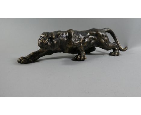 A Bronze Effect Study of a Lioness, 41cm Long, (Plus VAT) 