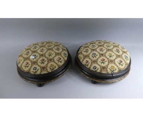 A Pair of Late Victorian Tapestry Topped Circular Footstools on Three Feet, Each 32cm Diameter 