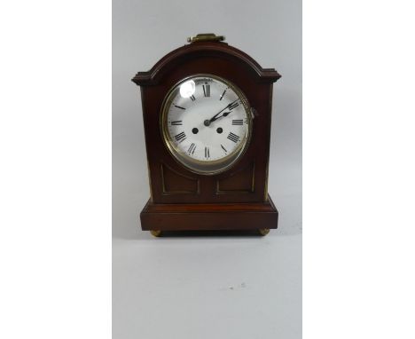 A Mahogany Cased Bracket Clock with Brass Carrying Handle and Arched Mahogany Case, White Enamelled Dial with Eight Day Movem