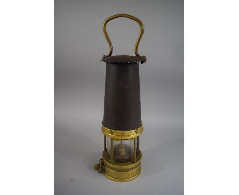 A Brass and Steel Miners Safety Lamp, Stamped 1911, 34cm High 