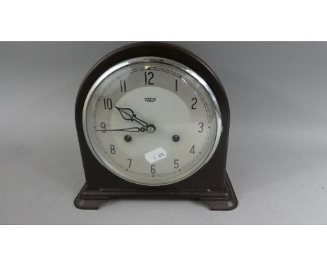 A 1930's Bakelite Arched Top Mantle Clock by Smiths, 22cm Wide 