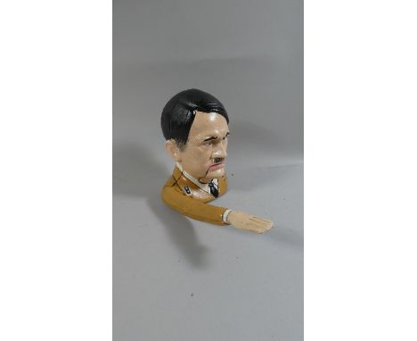 A Novelty Reproduction Cast Metal Nutcracker in the Form of Hitler Doing Nazi Salute, Plus VAT 