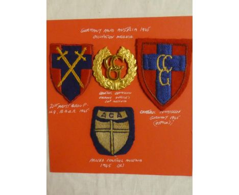 An Officers gilt Control Commission Germany cap badge, embroidered shield arm badge, 21st Army Group Headquarters badge and a