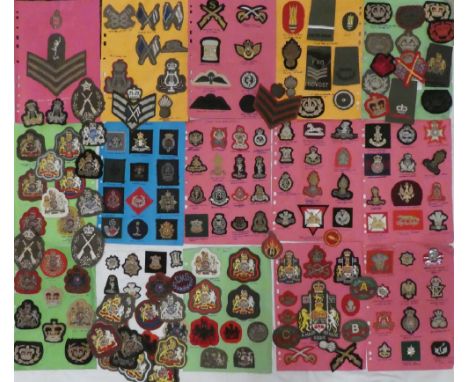 A collection of embroidered wire and cloth Military badges and insignia including 9/12 Lancers, Sherwood Rangers Yeomanry, Ro
