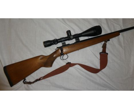 A CZ .22 model 452-2E American bolt action semi automatic rifle No.A288483 with sound moderator and Simmons 24x50 telescopic 