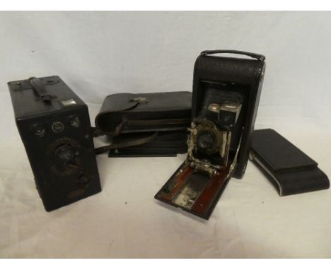 A Kodak 3A B5 version folding camera circa 1914 complete with additional back and three double sided plate holders and a Midg