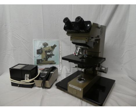 A Vickers Photoplan M41 photographic microscope system with four lens turrets and accessories