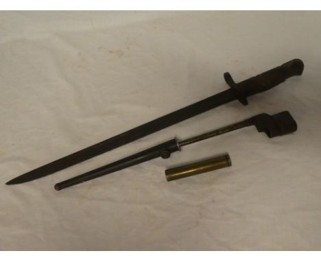 A First War Lee Enfield bayonet, brass Lee Enfield oil bottle and a steel spike bayonet with scabbard (3)